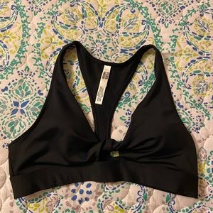 Pink Victoria’s Secret sports bra